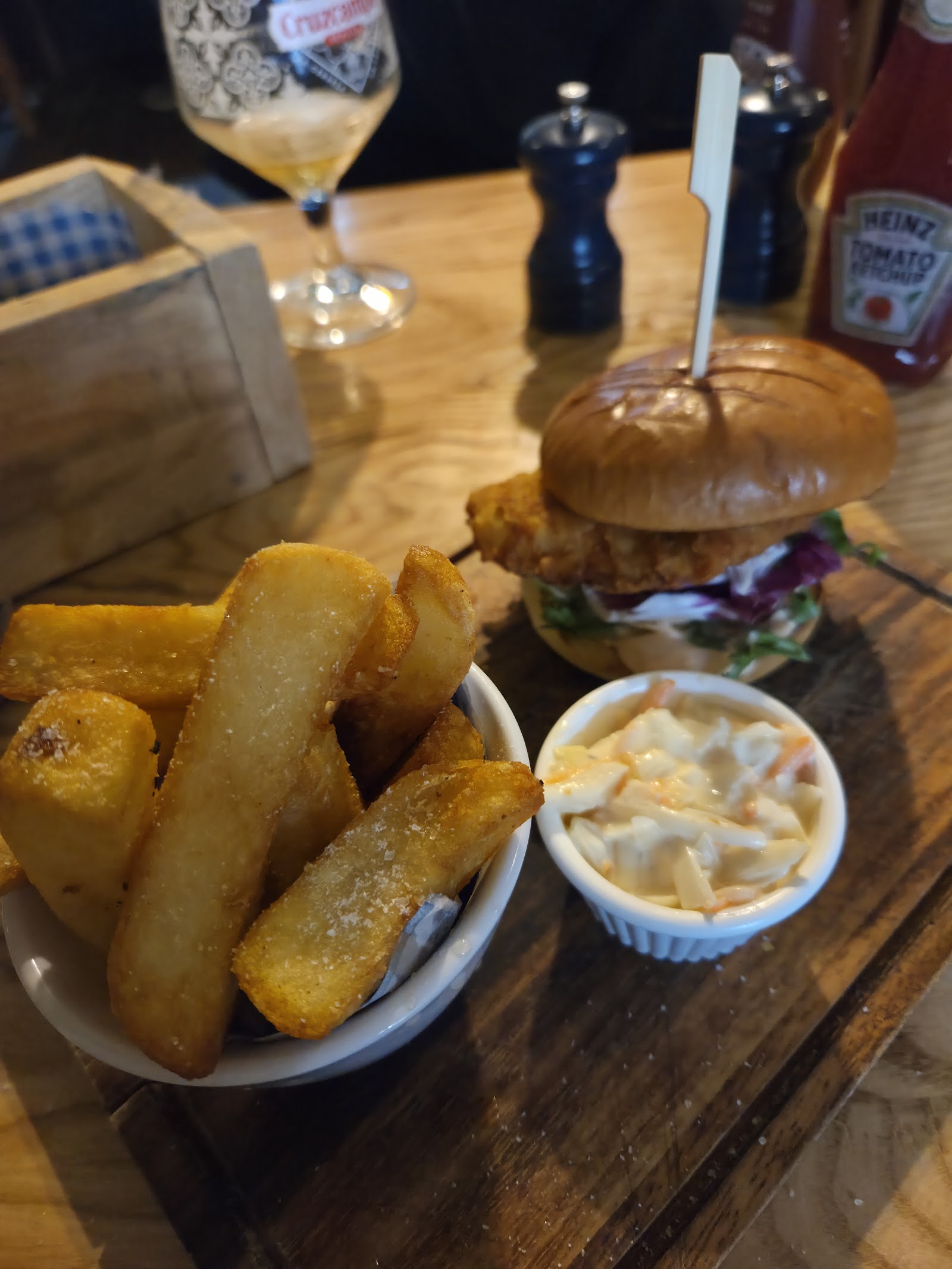 Buttermilk chicken burger with triple-cooked chips and coleslaw